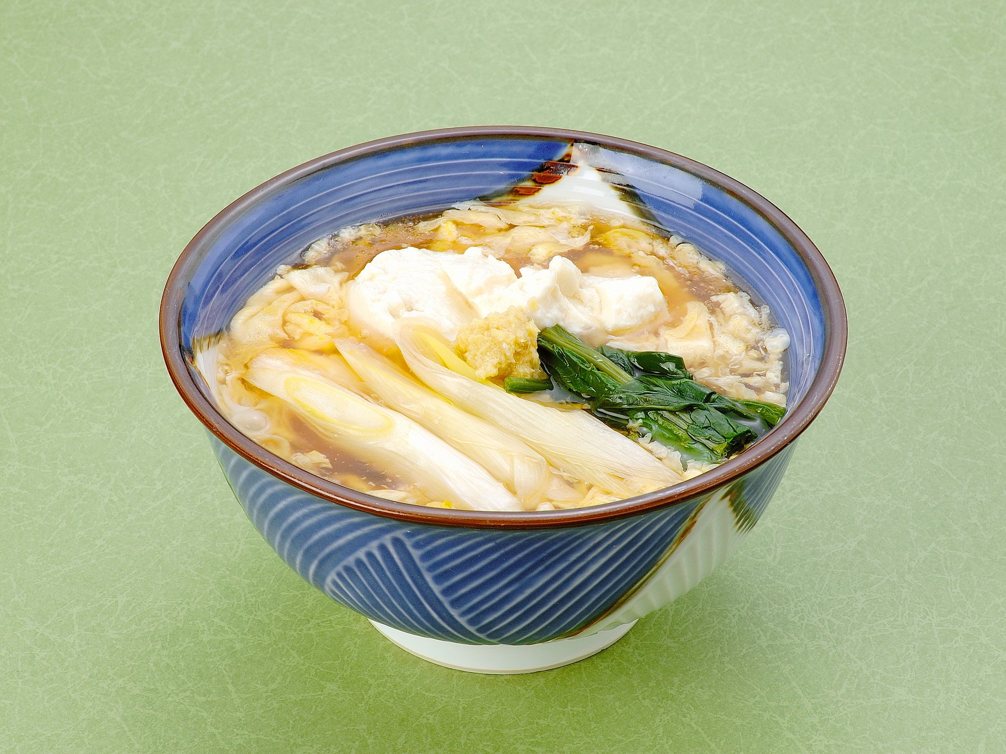 豆腐けいらんそば…1,100円｜熱々の豆腐そば。あんかけになっており生姜をたっぷり入れて体の芯からぽっかぽ...